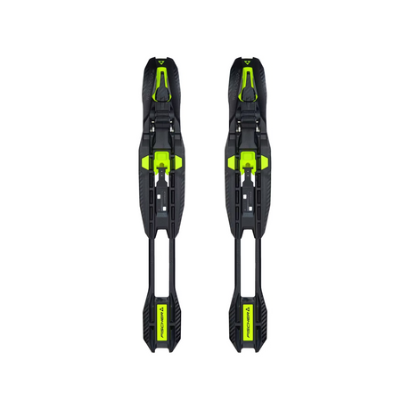 Pair of black ski bindings with green accents on a white background