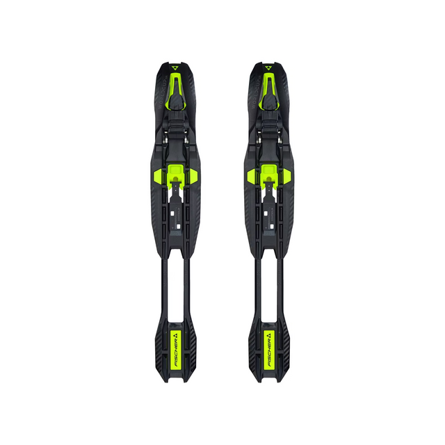 Pair of black ski bindings with green accents on a white background